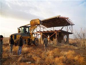 اجراي احکام قضايي رفع تصرف از اراضي دولتي و ملي در منطقه هفتباغ علوي کرمان